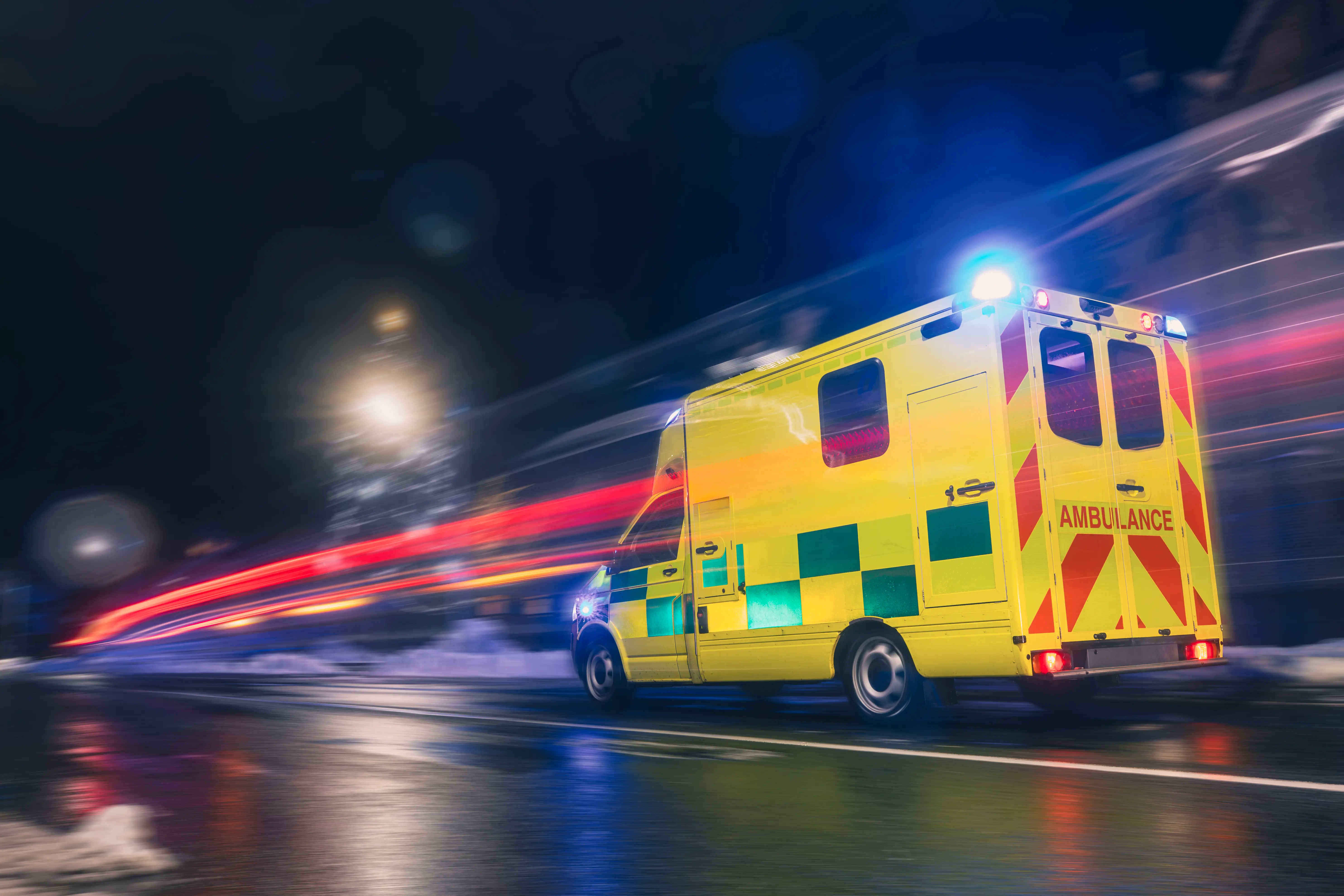 C1 ambulance training vehicle driving through city streets