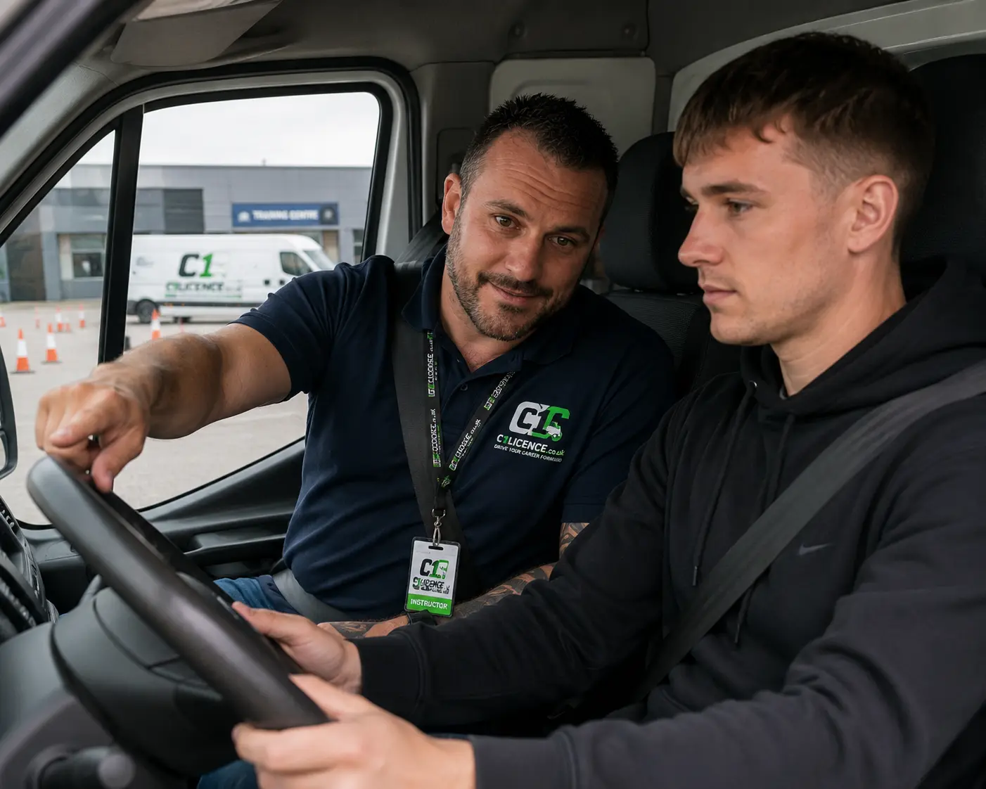 C1 instructor explaining practical licence training inside a C1 vehicle