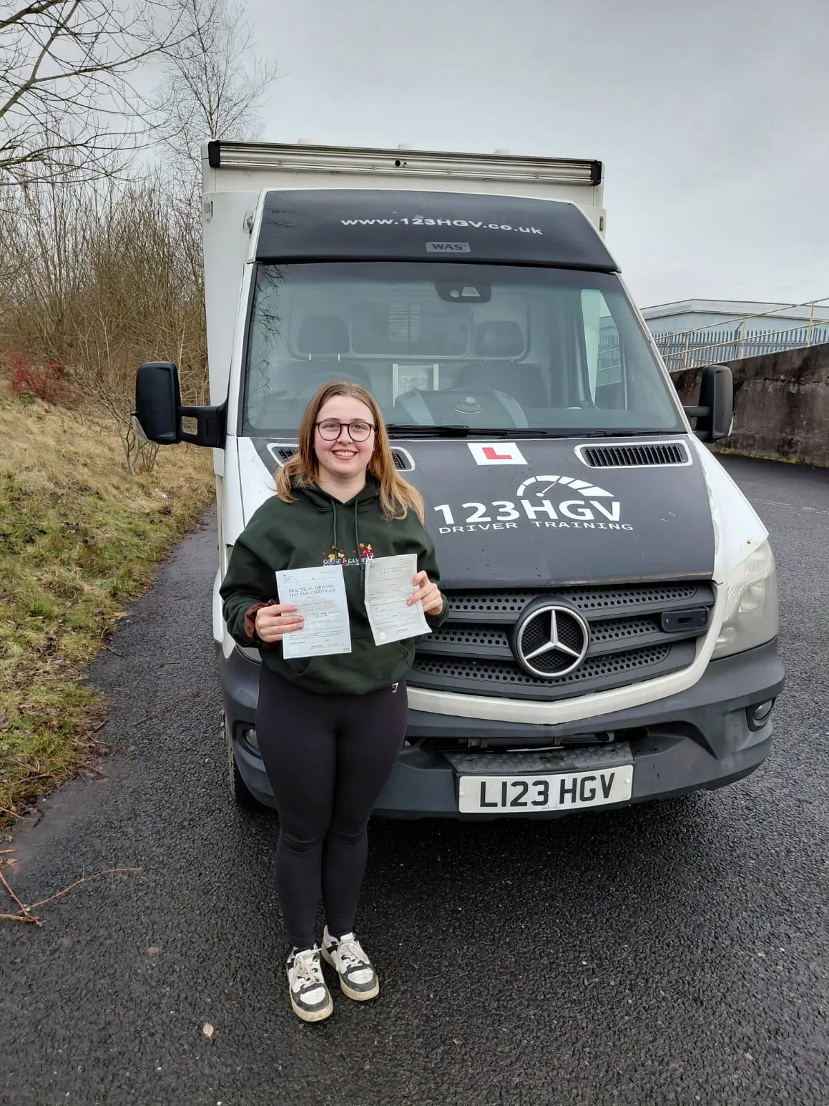 Learner pass photograph after C1 ambulance training in wet weather